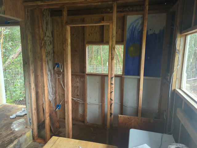 photo of the interior of the studio showing the framing for the wall of the new bathroom