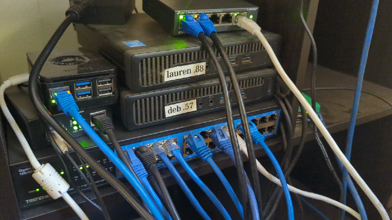 animated gif of servers and network switches with an assortment of flashing lights
