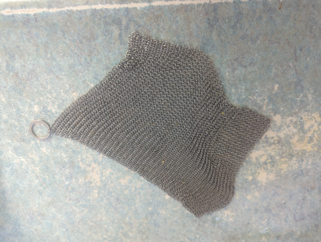 photo of a chain mail pot scrubber
