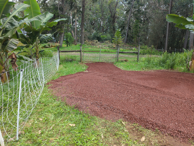photo showing the leftover cinder smoothed into a beautiful driveway at the makai gate