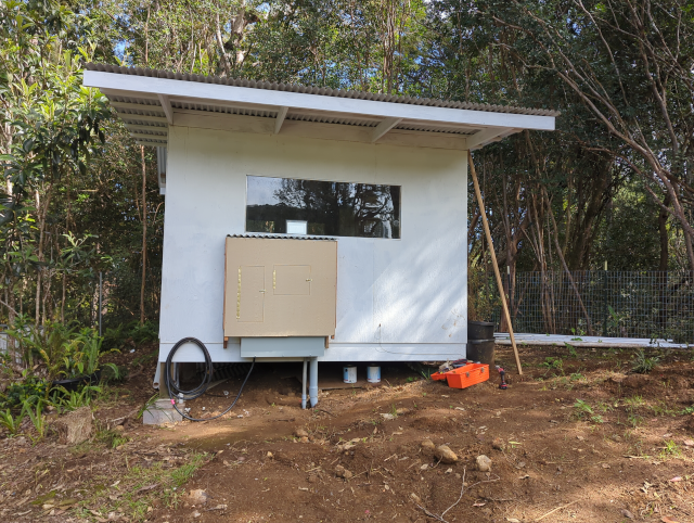 photo of a cabinet covering the solar and electric distribution equipment at the studio