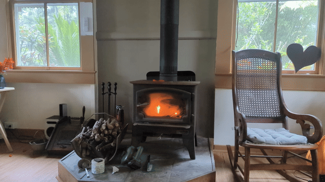 animated gif of a fire in the iron woodstove in our living room
