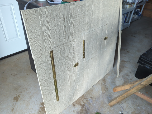 photo of the front panel of the enclosure ready to be installed