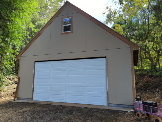 photo of the new garage with the door partially installed