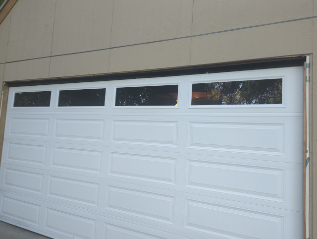 photo of the garage door closed with the brushes filling the gap at the top