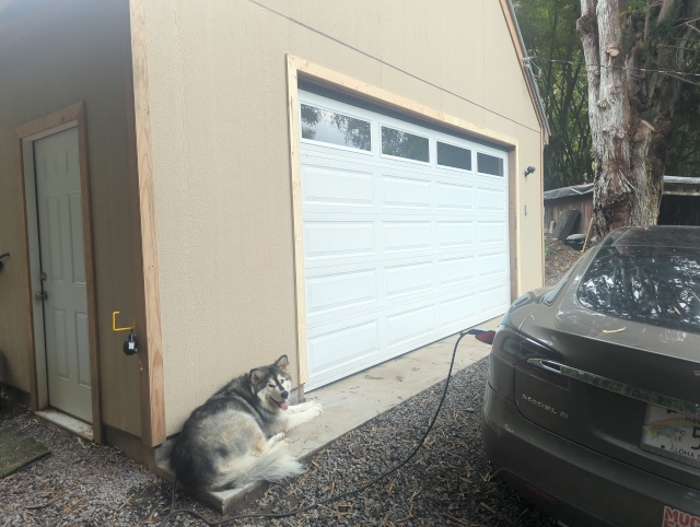 another photo of the garage with the door trimmed out