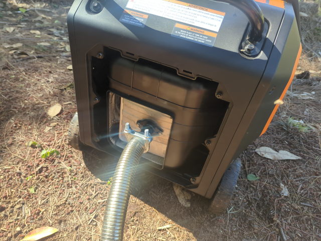 photo of the generator with the Zombiebox adapter and exhaust pipe attached