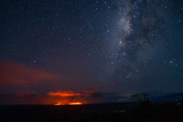 photo from the National Park Service showing Kīlauea erupting against a night sky