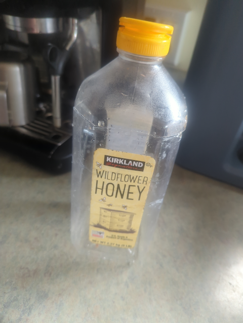 photo of a plastic Kirkland honey jar