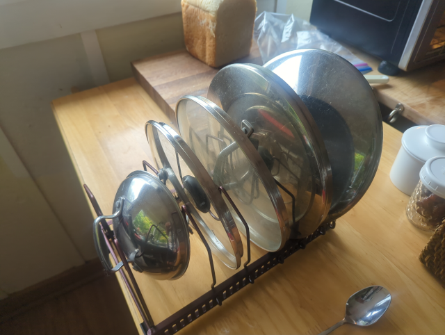 photo of the new lid rack assembled and populated with lids