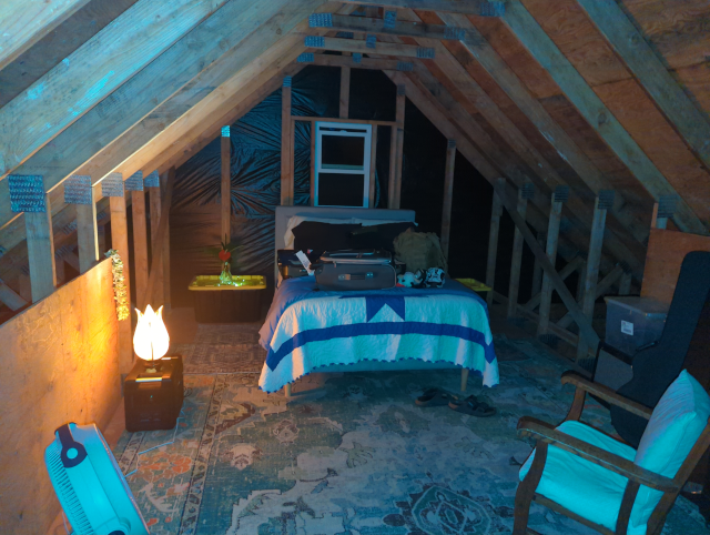 photo of the loft in our garage, set up as a makeshift guest room