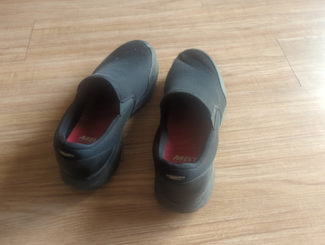 photo of a pair of black MBT shoes