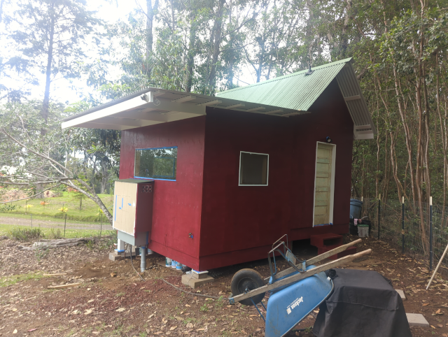 photo of the studio with some red rolled on as the base