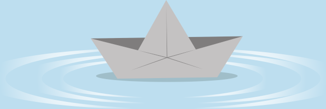 illustration of a folded paper boat floating on water