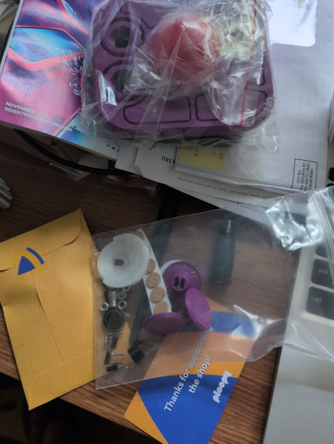 photo showing a kit of parts that will eventually be a Ploopy A+ trackball