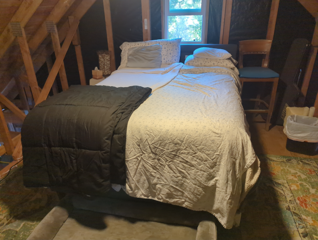 photo of the loft with the queen bed in it