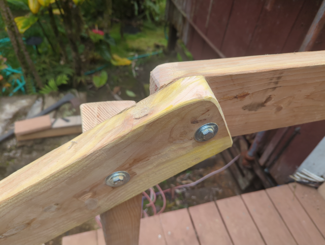 photo of the handrail where the horizontal and angled parts meet, sanded down to make the transition smooth