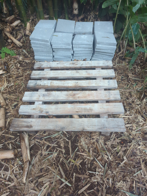 photo of 64 concrete stepping stones and a pallet