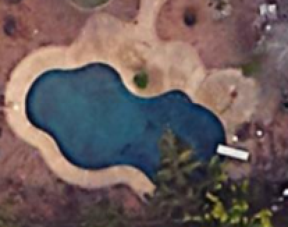 a satellite view of the swimming pool