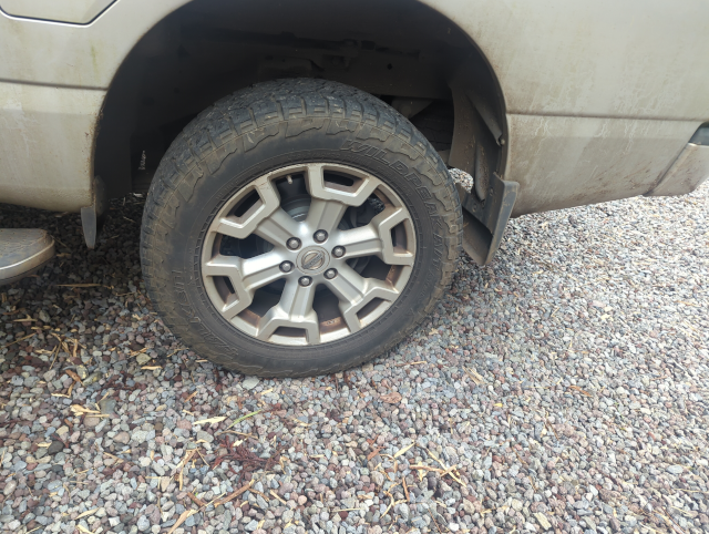 photo showing a wheel and tire on Timmy the Titan, Nissan XD pickup truck