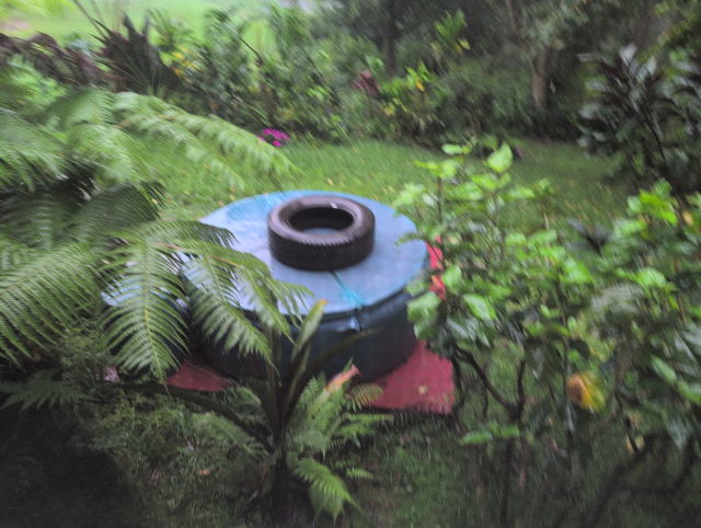 photo of the hot tub with a large truck tire on top