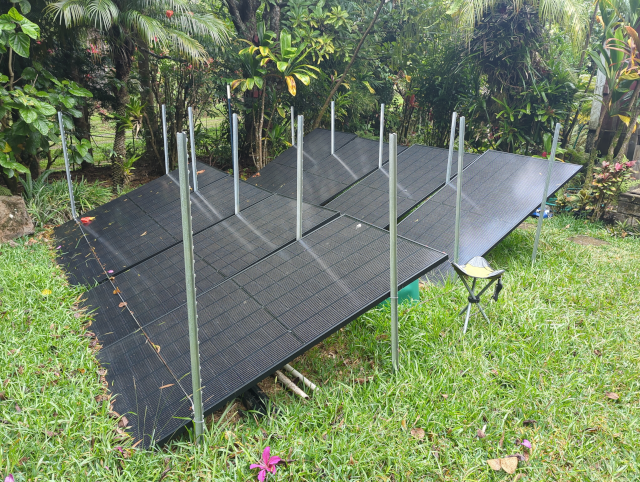 photograph of solar panels mounted on t-posts