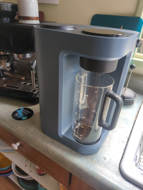 photo of our countertop water filter, looking much like a coffeemaker